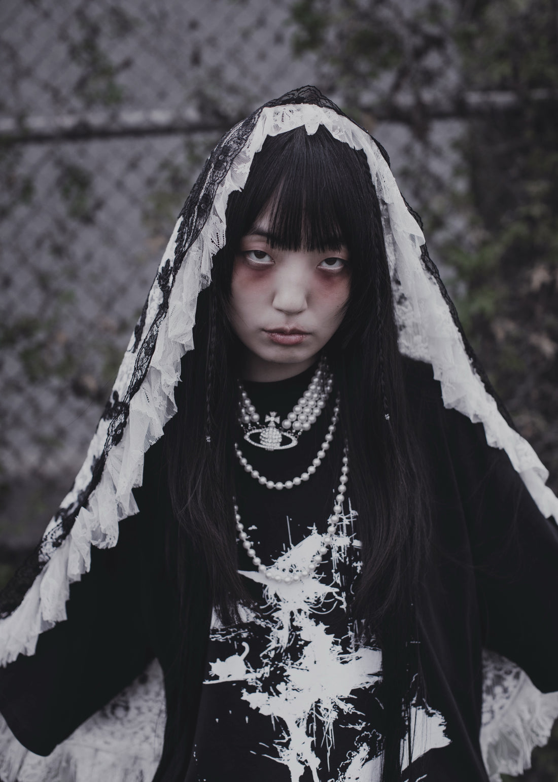 Model wearing the Bewitched T-Shirt from THE MIST