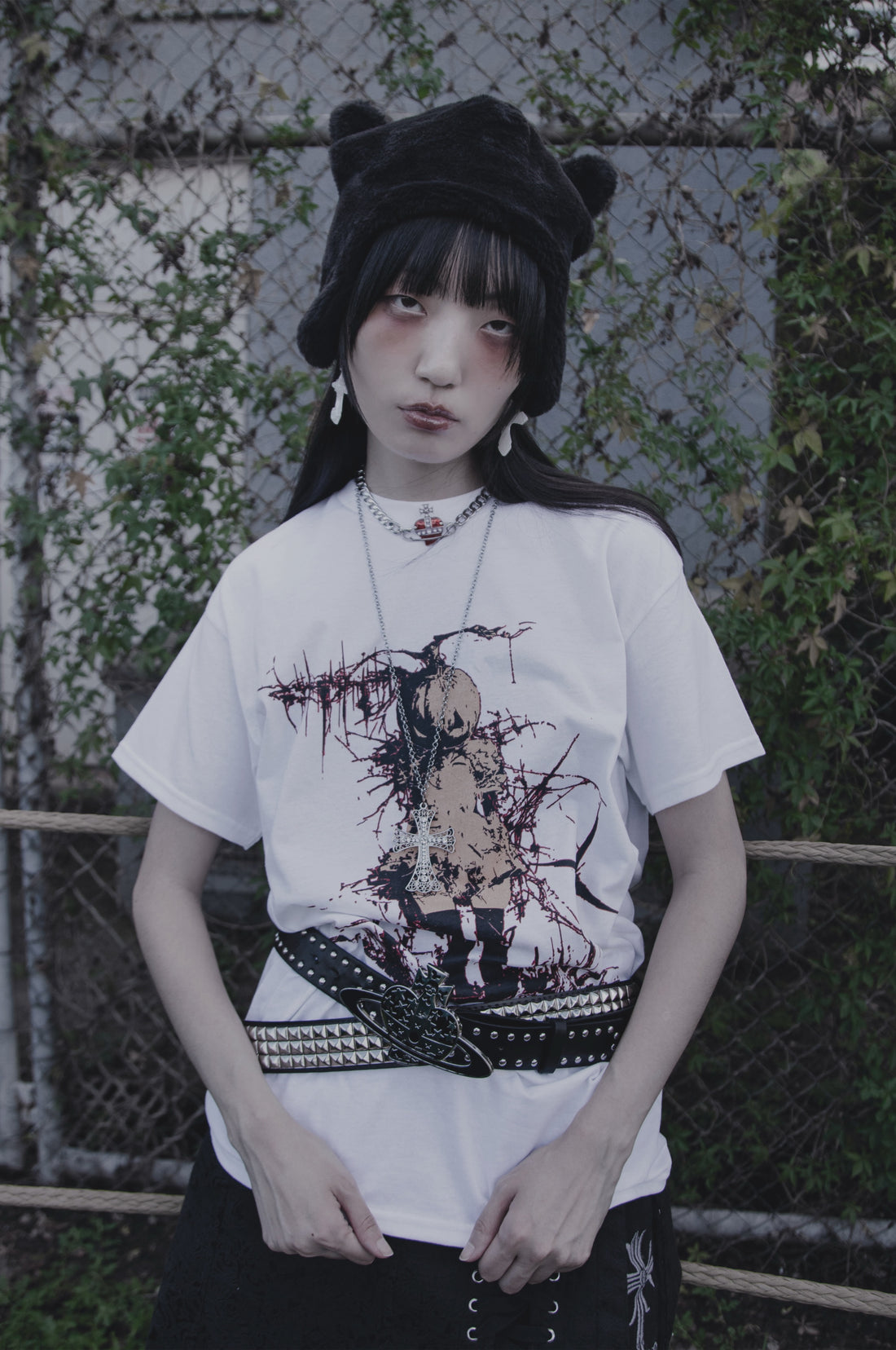 Model wearing the Cursed Pumpkin Oversized T-Shirt from THE MIST