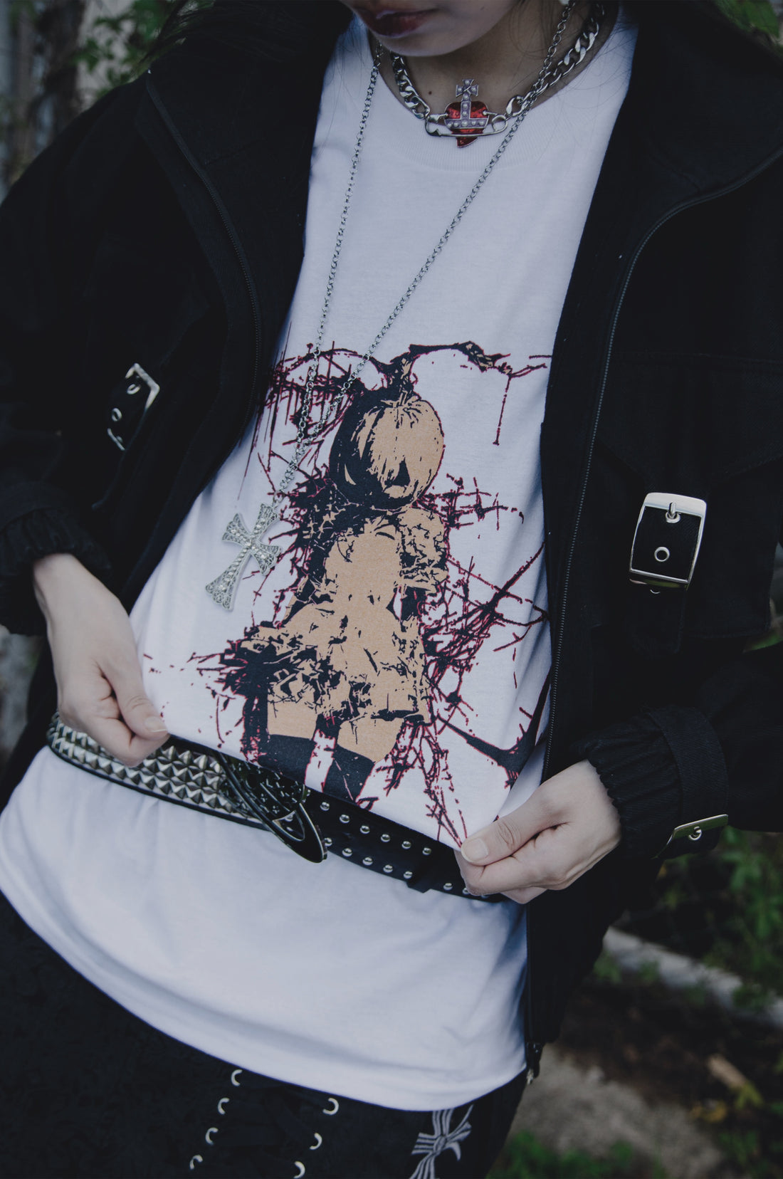 Model wearing the Cursed Pumpkin Oversized T-Shirt from THE MIST