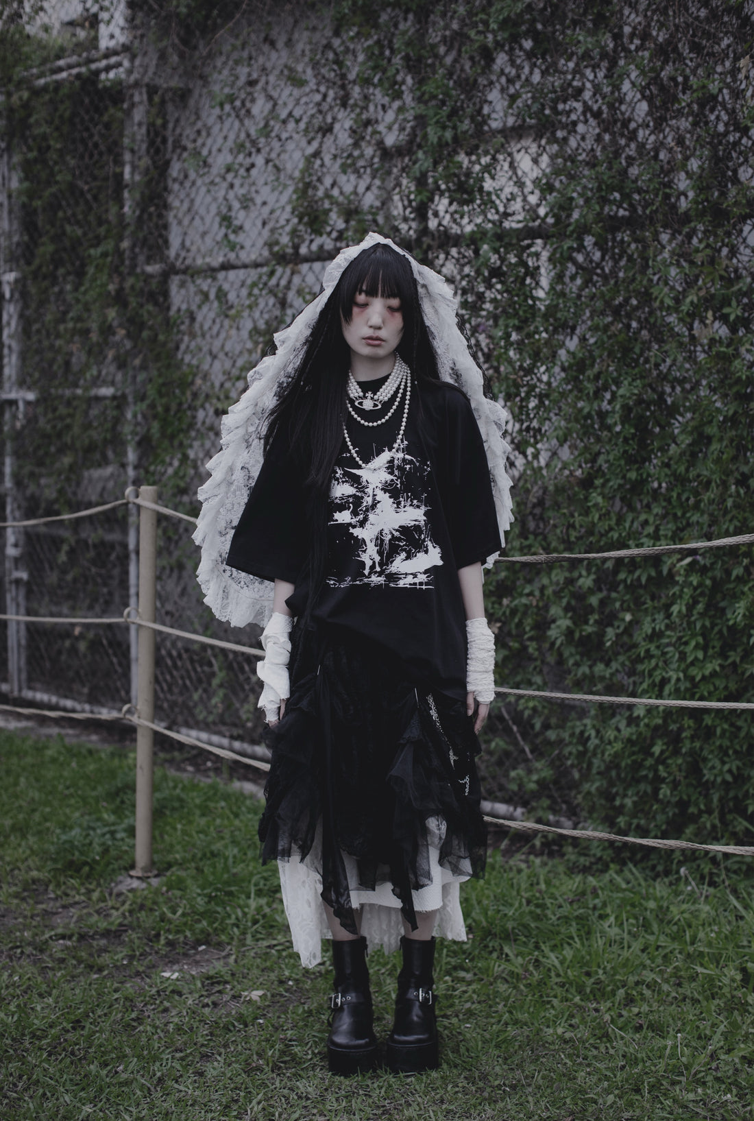 Model wearing the Bewitched T-Shirt from THE MIST
