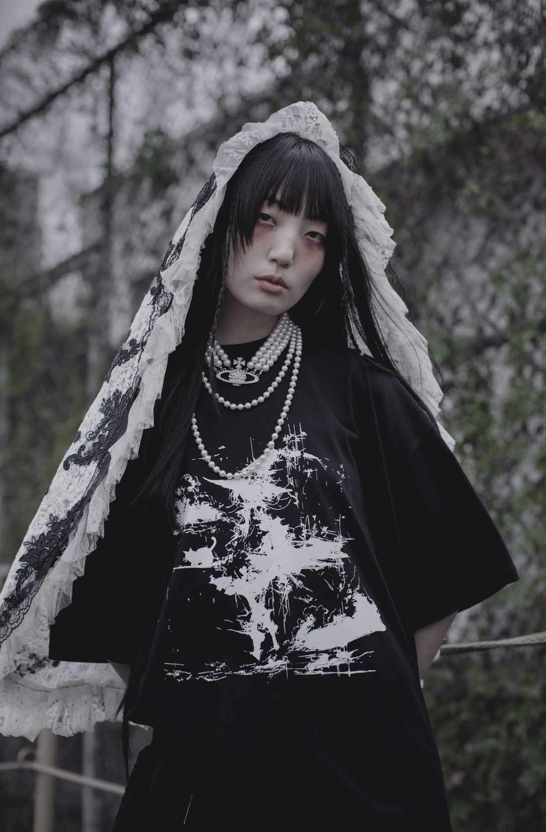 Model wearing the Bewitched T-Shirt from THE MIST