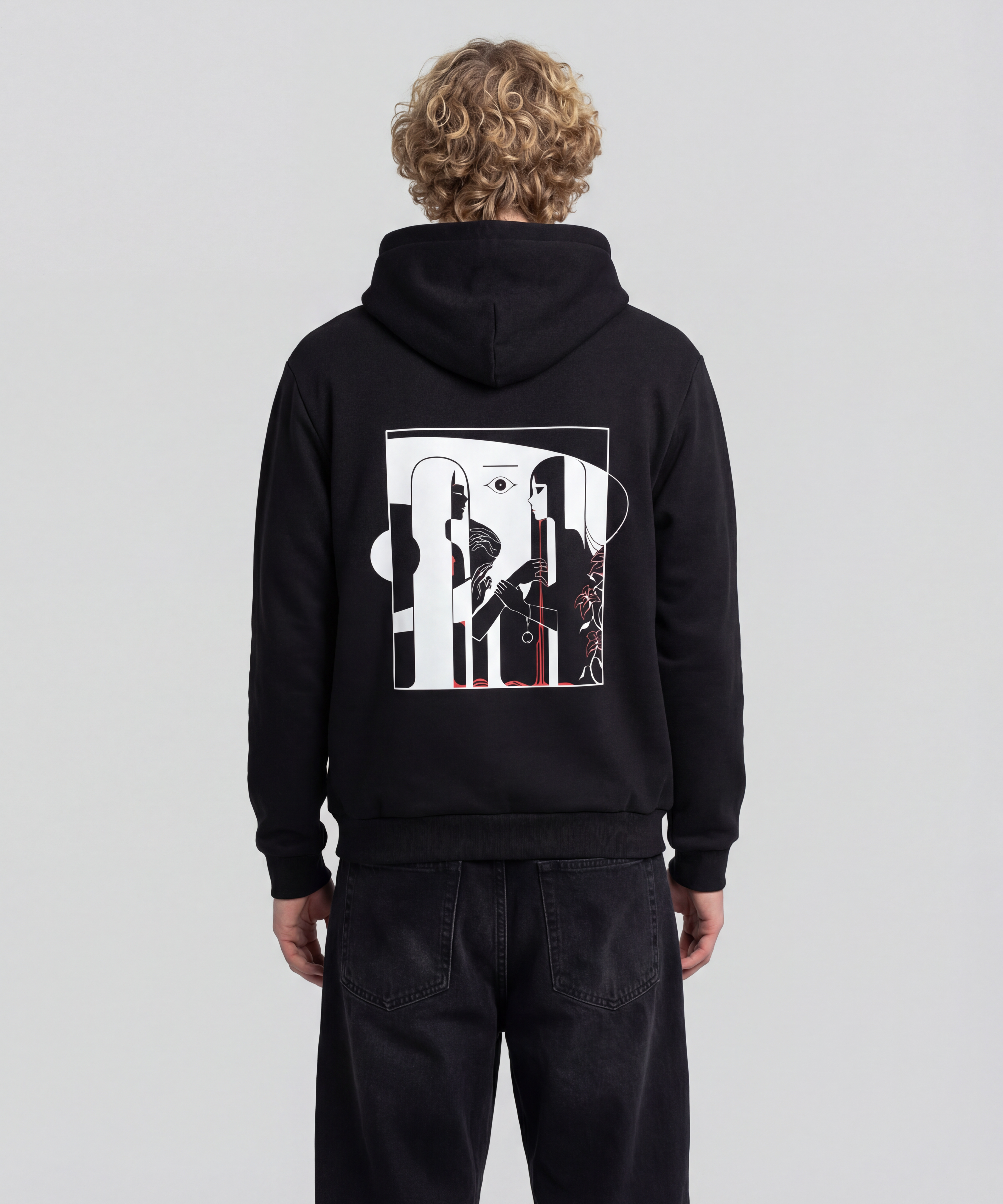 wearing_a_cotton_heritage_hoodie_Model_wearing_baggy_dark_black_jeans_with_a_light_grey_think_hoodie_on_the_graphic_is_on_the_back_the_model_should_be_facing_his_back_to_the_camera_th.png